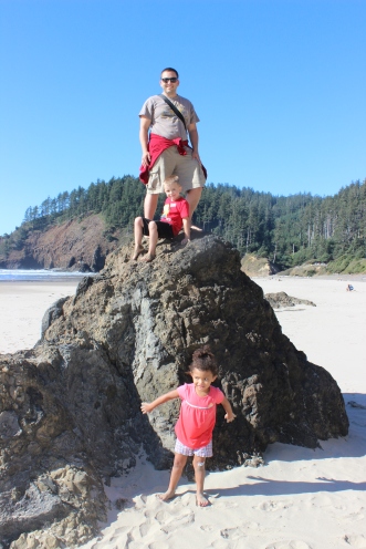 Climbing the rocks (they are sharp on bare feet!) at Ecola State Park